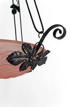 Charger l'image dans la galerie, Importante suspension / lustre en fer forgé à décor de vigne, vasque en verre rose pressé-moulé à décor de fleurs géométriques, Art Deco, France, circa 1930