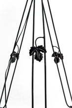 Charger l'image dans la galerie, Importante suspension / lustre en fer forgé à décor de vigne, vasque en verre rose pressé-moulé à décor de fleurs géométriques, Art Deco, France, circa 1930