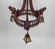 Load image into Gallery viewer, Lustre néo gothique sculpté aux bouffons et lanternes, France, circa 1900