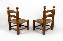 Charger l&#39;image dans la galerie, Paire de chaises basses paillées par Charles Dudouyt, circa 1940
