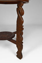 Load image into Gallery viewer, Table basse sculptée de dragons et de paons, Indonésie, vers 1920
